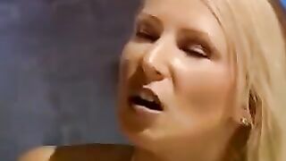 A beautiful woman is tied up and fucked by two men hard