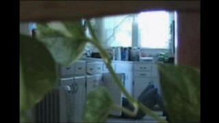 A married couple has an apartment walk, getting naked