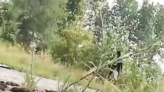 A girl in power shows her strength over a man