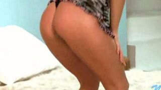 A young Russian lecherous girl shows her sexual body parts while stripping