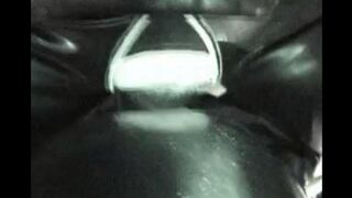 A hotwife has fun with someone in latex while her husband watches