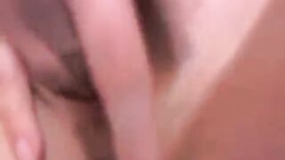 A hot Russian girl with beautiful breasts plays with a toy on camera