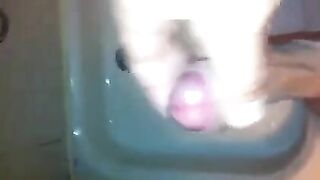 The kid caresses his dick in the shower, almost like in a steamy spy scene