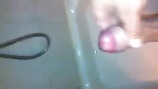 The kid caresses his dick in the shower, almost like in a steamy spy scene