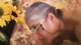 The man had sex with a gray-haired woman in black stockings