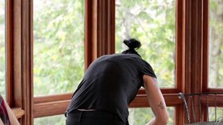 Vietnamese with a strap-on fucks a young virgin in the kitchen