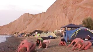 A hot chick is playing volleyball naked on the nude beach