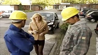 Girl in black pantyhose fucks with guys on the set of porn