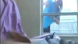 A woman peeps on a guy jerking off in his ward