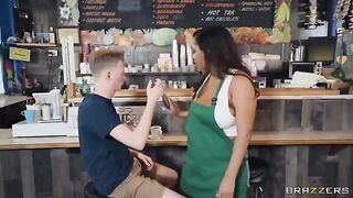 Busty girl is working as a barista in the coffee shop