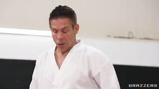 A girl is getting fucked in an uncomfortable position against the wall