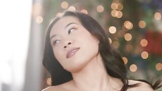 A cute Asian girl licks her own pussy juice and tastes it