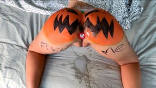 A sexy slut fucks a pumpkin, imitating a passionate sex act