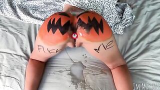 A sexy slut fucks a pumpkin, imitating a passionate sex act