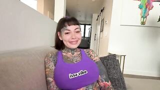 A girl with a split tongue breeds with her tattooed big tits in POV style