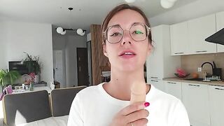 A girl with a hot tattoo is gently being femdommed, and she loves it