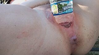 A girl reached a peak of pleasure while wanking on the street
