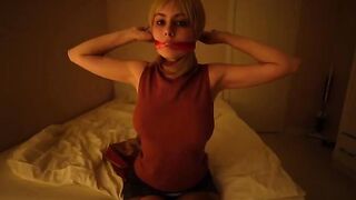 A girl in a police uniform pleads for a deep throat, showcasing her Resident Evil cosplay passion